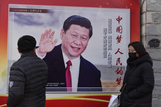 中国大会议通过国家主席连续任期宪法修正案引发谈论