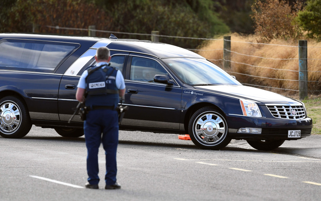 A hearse arrives for a funeral ceremony at Memorial Park cemetery in Christchurch on March 20, 2019.  (Photo by WILLIAM WEST / AFP)