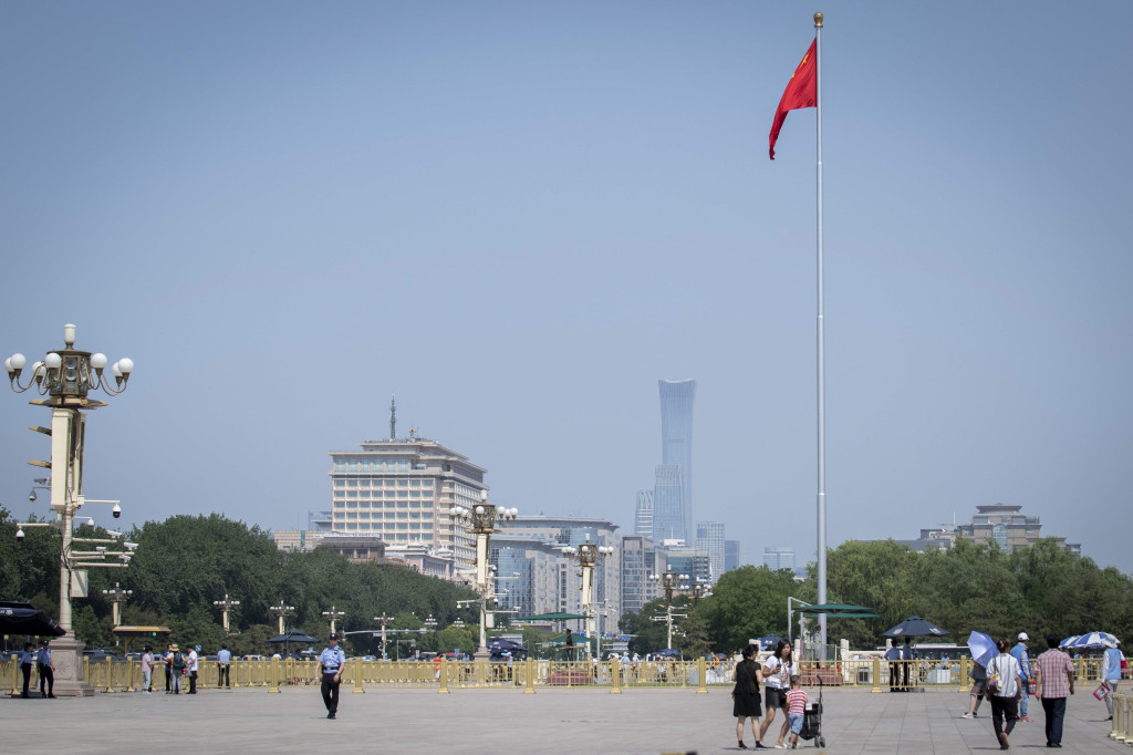 Police officers secure Tiananmen Square in Beijing on June 3, 2019, China will mark 30 years since the Tiananmen crackdown on June 4, 1989. (Photo : Nicolas ASFOURI / AFP)