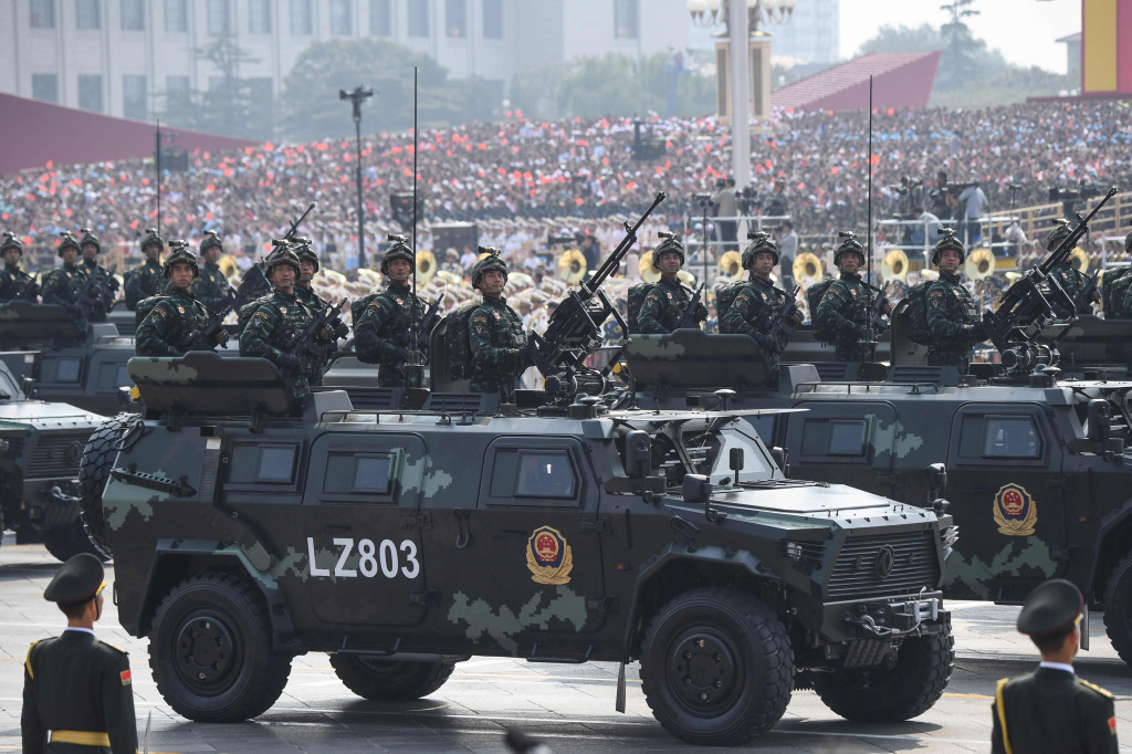 Chinese soldiers participate in a military parade at Tiananmen Square in Beijing on October 1, 2019. (Photo by GREG BAKER / AFP)