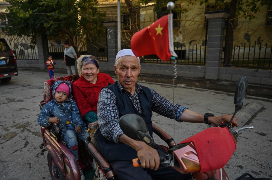 Uighur people in Xinjiang Province, China. (photo : AFP)