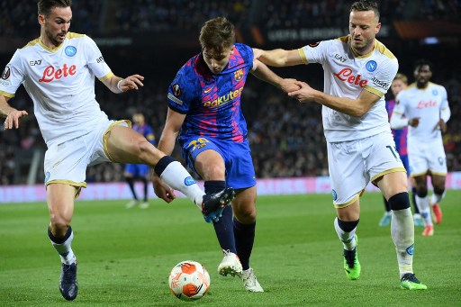 Barcelona vs Napoli. (LLUIS GENE / AFP)