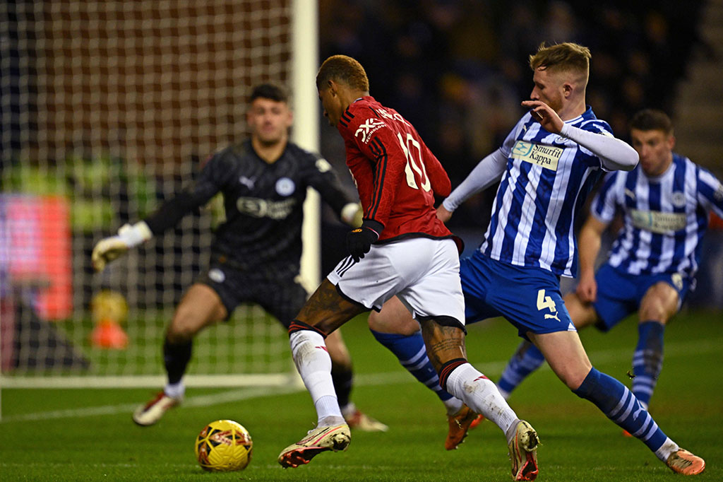 Manchester United vs Wigan Athletic. (photo : AFP)
