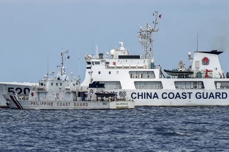  China and Philippine Coast Guard Vessels collide in South China Sea. (photo : AFP)