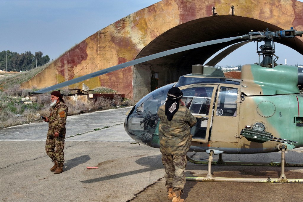 Thousands of Syrian Military Personnel Flee to Iraq.  AFP PHOTO/Omar Haj Kadour