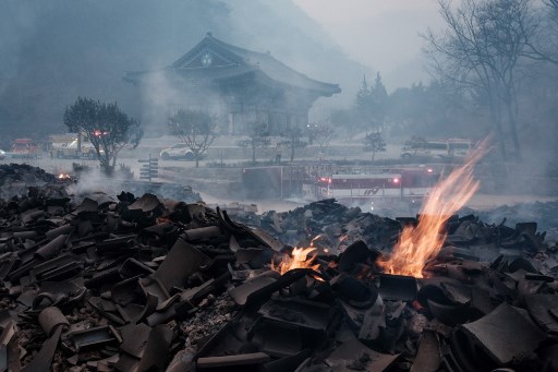 At least 18 people have been killed in one of South Korea worst wildfire outbreak. YASUYOSHI CHIBA / AFP